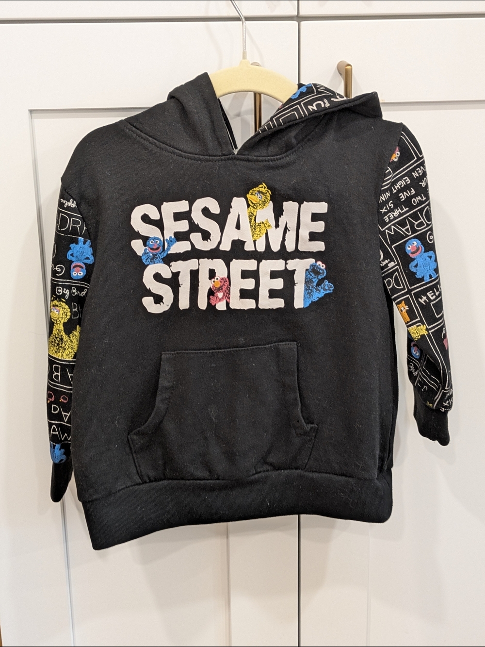 Sesame Street Black Hoodie with Colorful Character Accents